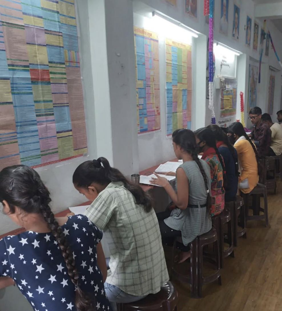 Students studying at Jana Vidya Foundation free learning center in Prayagraj India